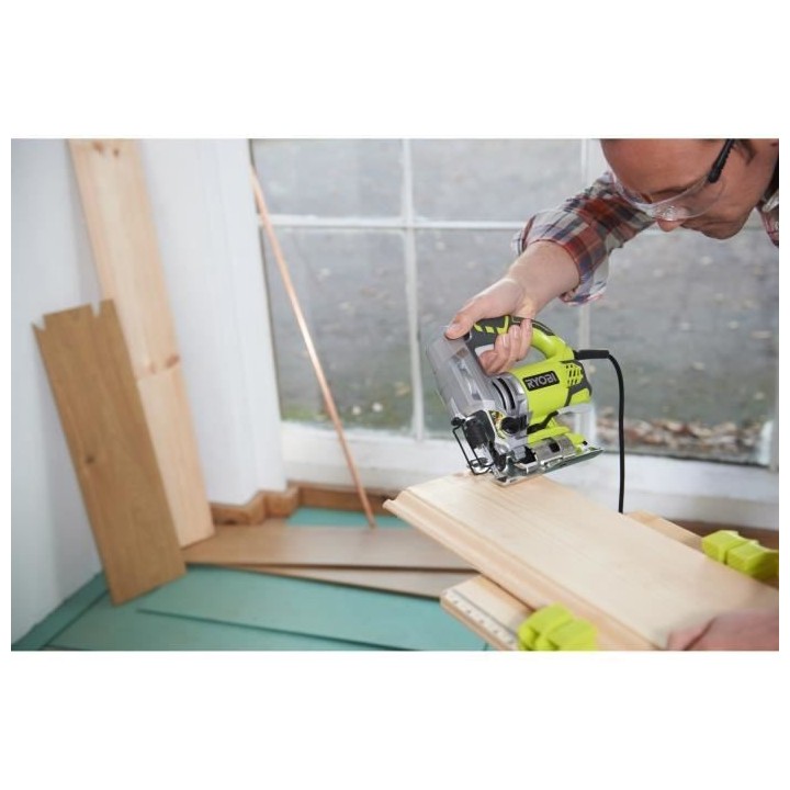 Scie sauteuse pendulaire RYOBI 600W 85mm bois - coffret de 5 lames RJS