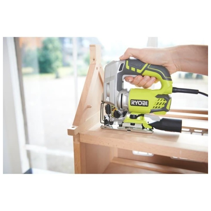 Scie sauteuse pendulaire RYOBI 600W 85mm bois - coffret de 5 lames RJS